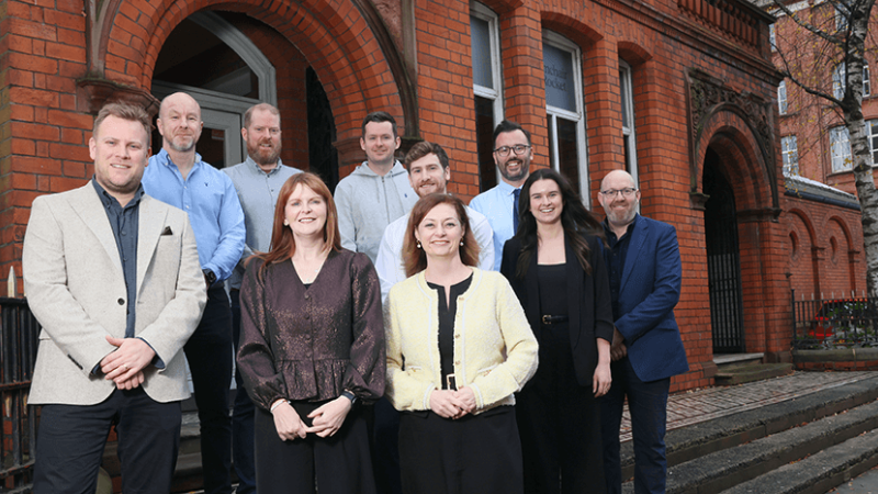 Seven companies are standing with the Minister for the Economy and Susan O'Kane, Invest NI in front of Ormeau Labs